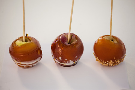 Close-up of three decorated apple against white backgroundの写真素材