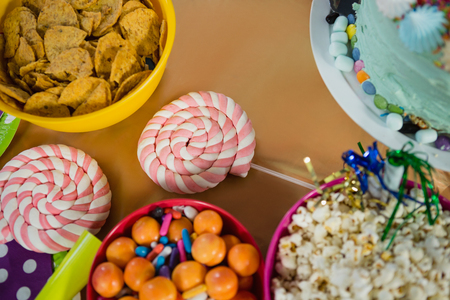 Various confectioneries on a table at homeの写真素材