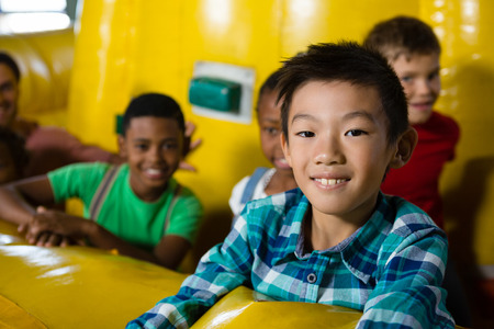 Children on bouncy castle during party