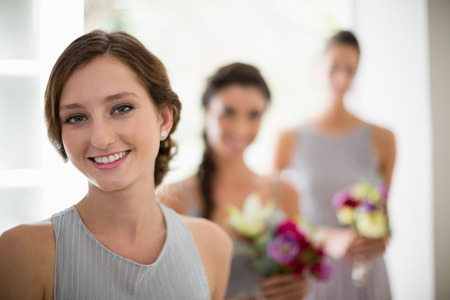Portrait of smiling bride at homeの写真素材