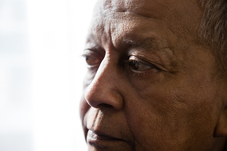 Close up of thoughtful senior man looking awayの写真素材