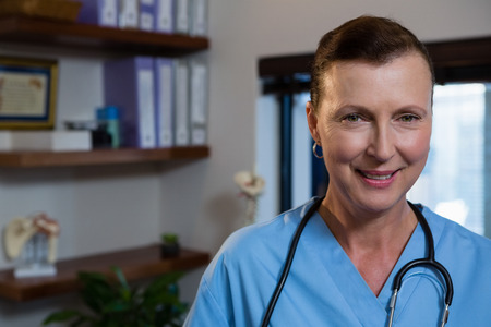 Portrait of smiling female doctor in hospitalの写真素材