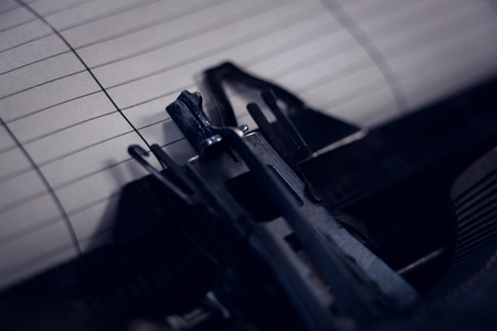 Cropped image of typewriter with paperの写真素材