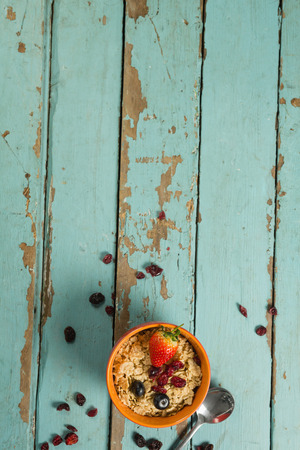 Overhead of wheaties cereal with fruits on wooden tableの写真素材