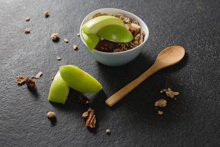 Overhead of breakfast cereals with fruits on black backgroundの写真素材