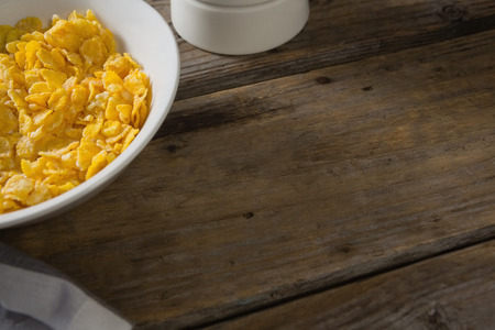 Close-up of wheaties cereal breakfast on wooden table