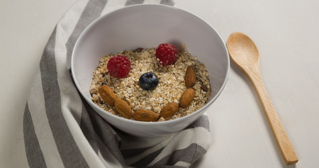 Overhead of breakfast cereals forming a smiley faceの写真素材