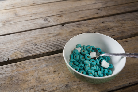 Close-up of marshmallow and cereal rings in bowl