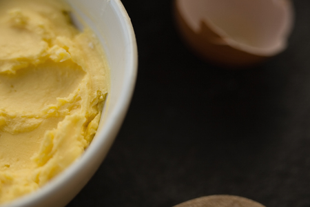 Close up of butter in bowl on tableの写真素材