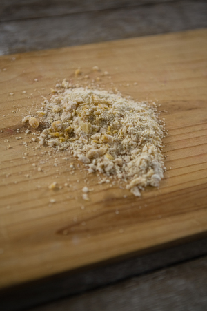 Close up of flour on wooden cutting boardの写真素材