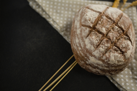 High angle view of brown bread on napkin at tableの写真素材