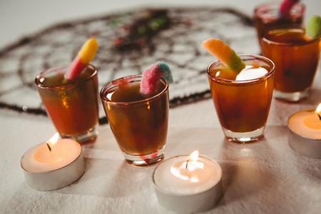 High angle view of drinks with candles and decorationの写真素材