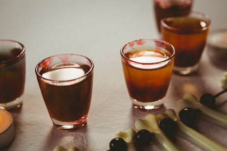 High angle view of drinks by decoration on white backgroundの写真素材