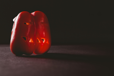 Close up of carved red bell pepper on tableの写真素材