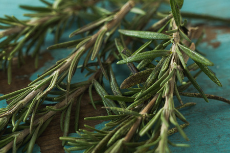 Close-up of rosemary on wooden tableの写真素材