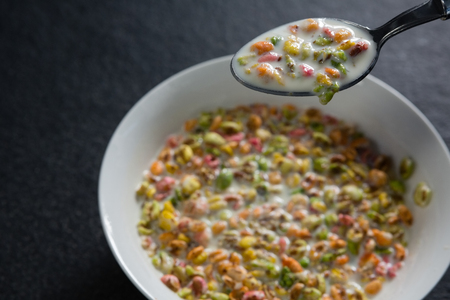 Close-up of cereal rings soaked in milk