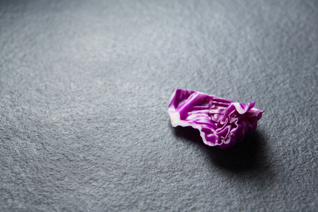 Close-up of red cabbage on slate