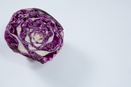 Close-up of halved red cabbage on a white backgroundの写真素材
