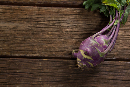 Close-up of kohlrabi on a wooden tableの写真素材
