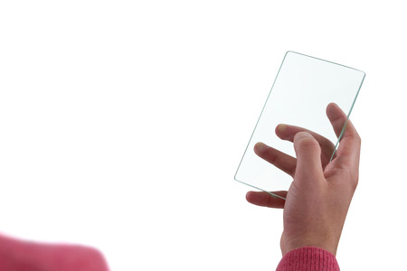 Close-up of man using glass mobile phone against white backgroundの写真素材