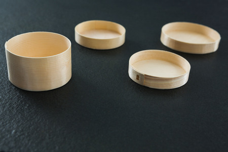 Close-up of empty wooden container on black backgroundの写真素材