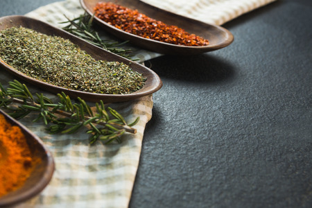 Close-up of various spices with herbs in a trayの写真素材
