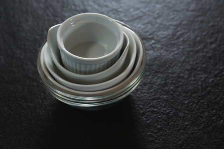 Close-up of clay bowls on black backgroundの写真素材