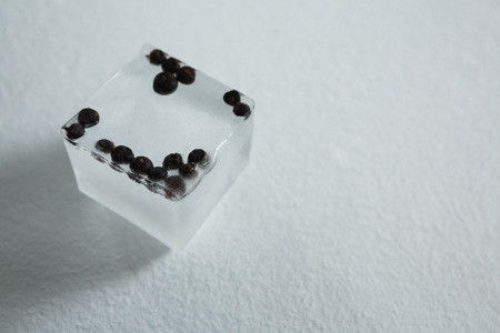 Close-up of flavored ice cubes with spicesの写真素材