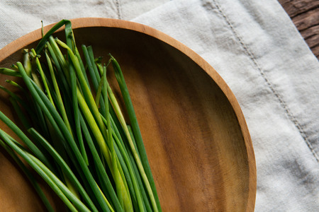 Close-up of fresh garlic chives in plate