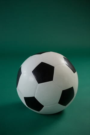 Close-up of football on green backgroundの写真素材