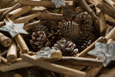 Artificial nest with decoration and thread spools on tableの写真素材