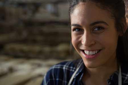 Close-up of happy female potterの写真素材