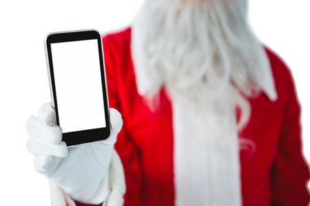 Mid-section of Santa Claus holding mobile phone against white backgroundの写真素材