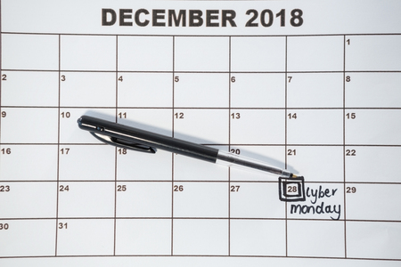 Close-u of pen on calender with marked dateの写真素材