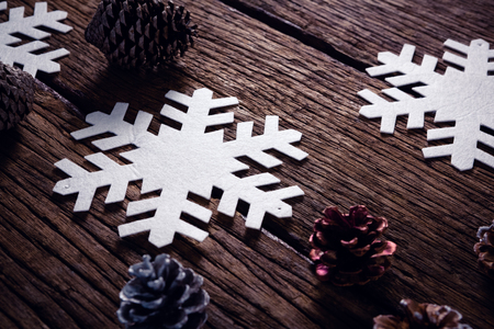 Close-up of christmas decoration on wooden plankの写真素材