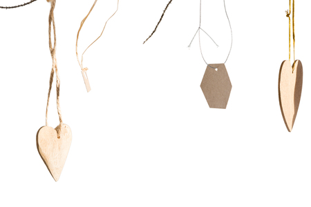 Close-up of handmade christmas decoration hanging against white backgroundの写真素材