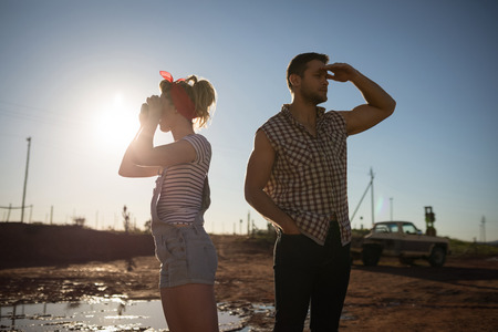 Young couple standing together on a sunny dayの写真素材