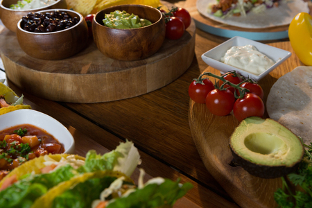 Various mexican food ingredients on wooden tableの写真素材