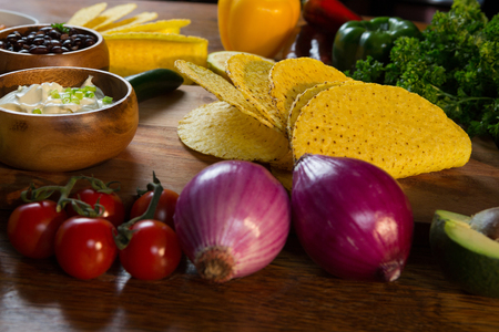 Various mexican food ingredients on wooden tableの写真素材