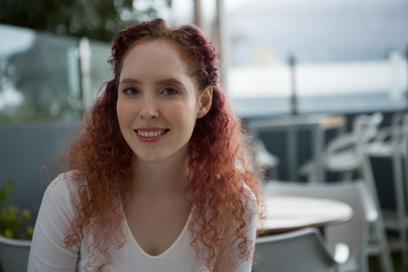 Portrait of beautiful woman smiling in the restaurant