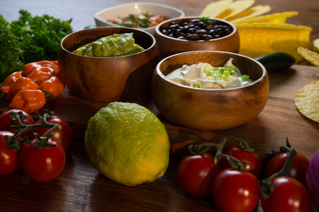 Various mexican food ingredients on wooden table
