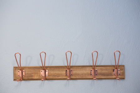 Close-up of hook attached on wall