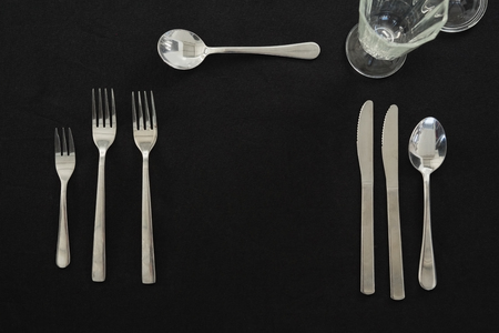 Black theme table setting with cutleryの写真素材