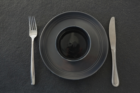Close-up of black theme table settingの写真素材