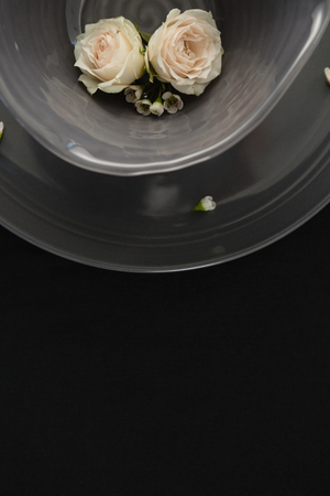 Close-up of beautiful table setting with floral arrangementの写真素材
