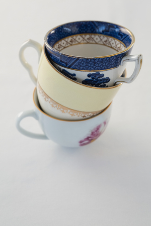 Close-up of stack of various cupsの写真素材