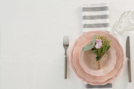 Overhead of elegance table setting on white backgroundの写真素材