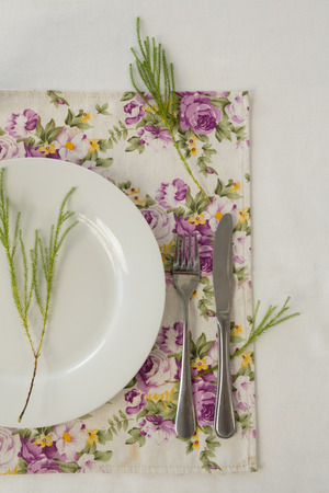 Overhead of elegance table setting on white backgroundの写真素材