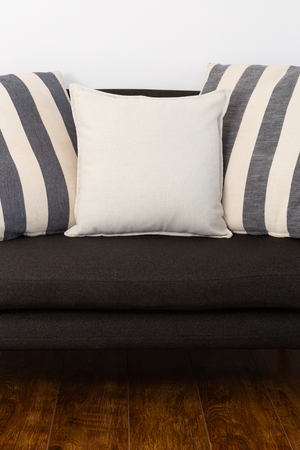 Various cushions arranged on sofa