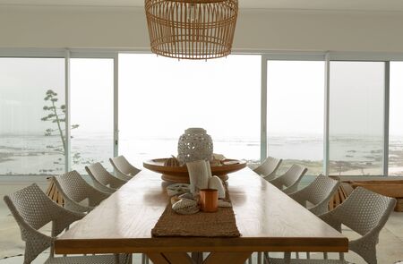 Modern dining room with dining table at homeの写真素材